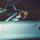 Image released by Iraqi news sources Wednesday April 30, 1997 showing President Hussein’s son Odai driving a car. Hussein’s eldest son was shot about 10 times on 12 December 1996 in Baghdad. Since then, he has been seen on television moving his arms but not his legs. He underwent surgery April 20 and told reporters he expected to resume his usual activities within several months. (AP Photo/Iraqi TV/APTV)